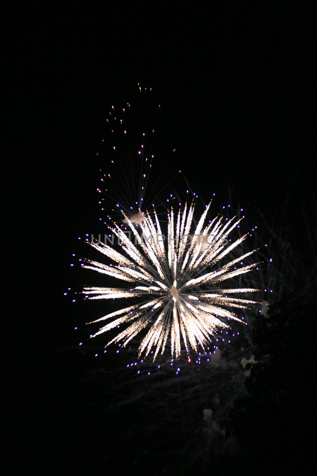 Fireworks display on a dark night by haiderazim
