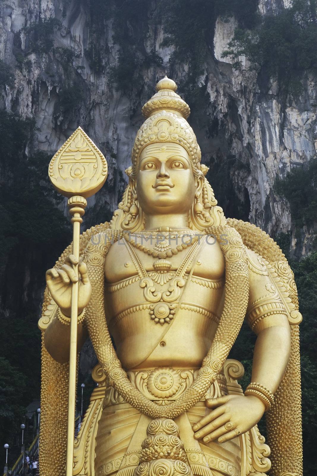 Close up Giant statue of Lord Murugan at Batu Caves temple in Kuala Lumpur, Malaysia. by haiderazim
