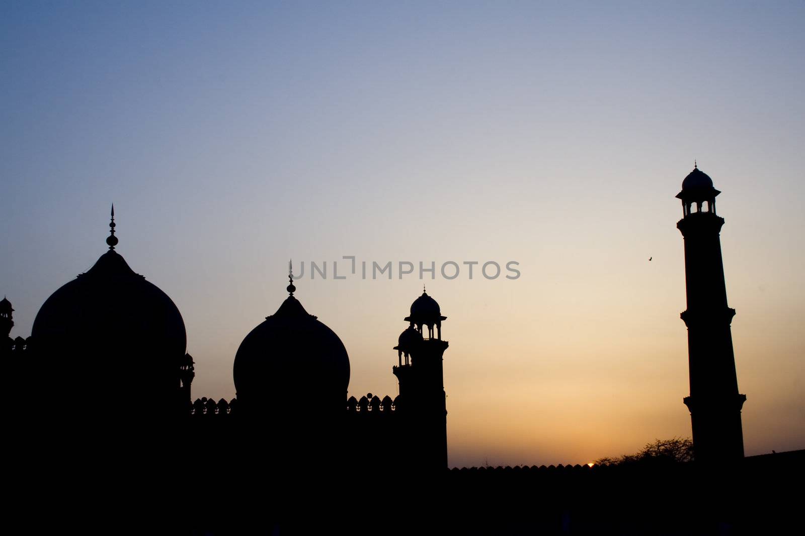 Silhouette of badshahi mosque by haiderazim