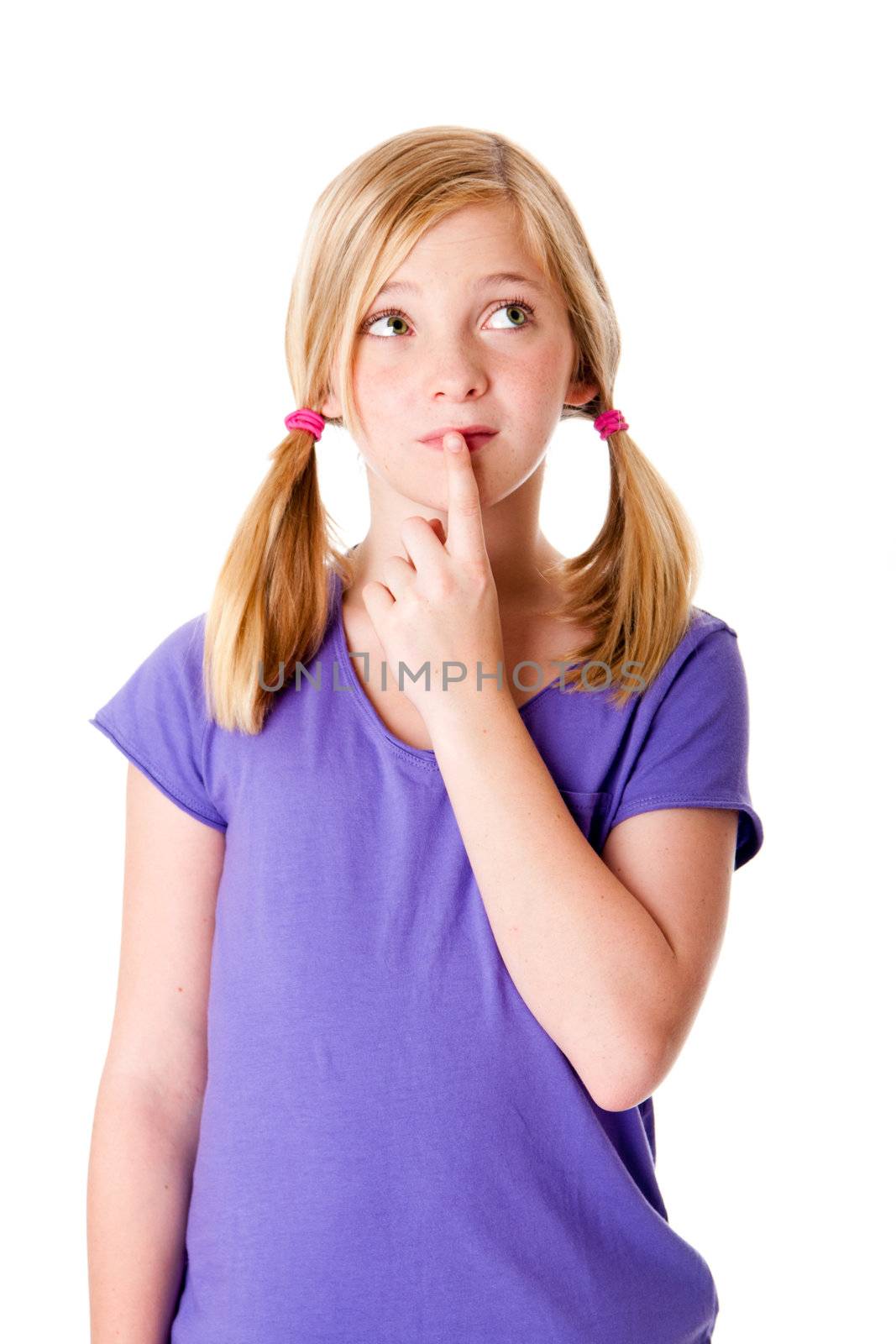 Beautiful cute teenager girl with pigtails thinking about her options with finger on lips and looking up, isolated.