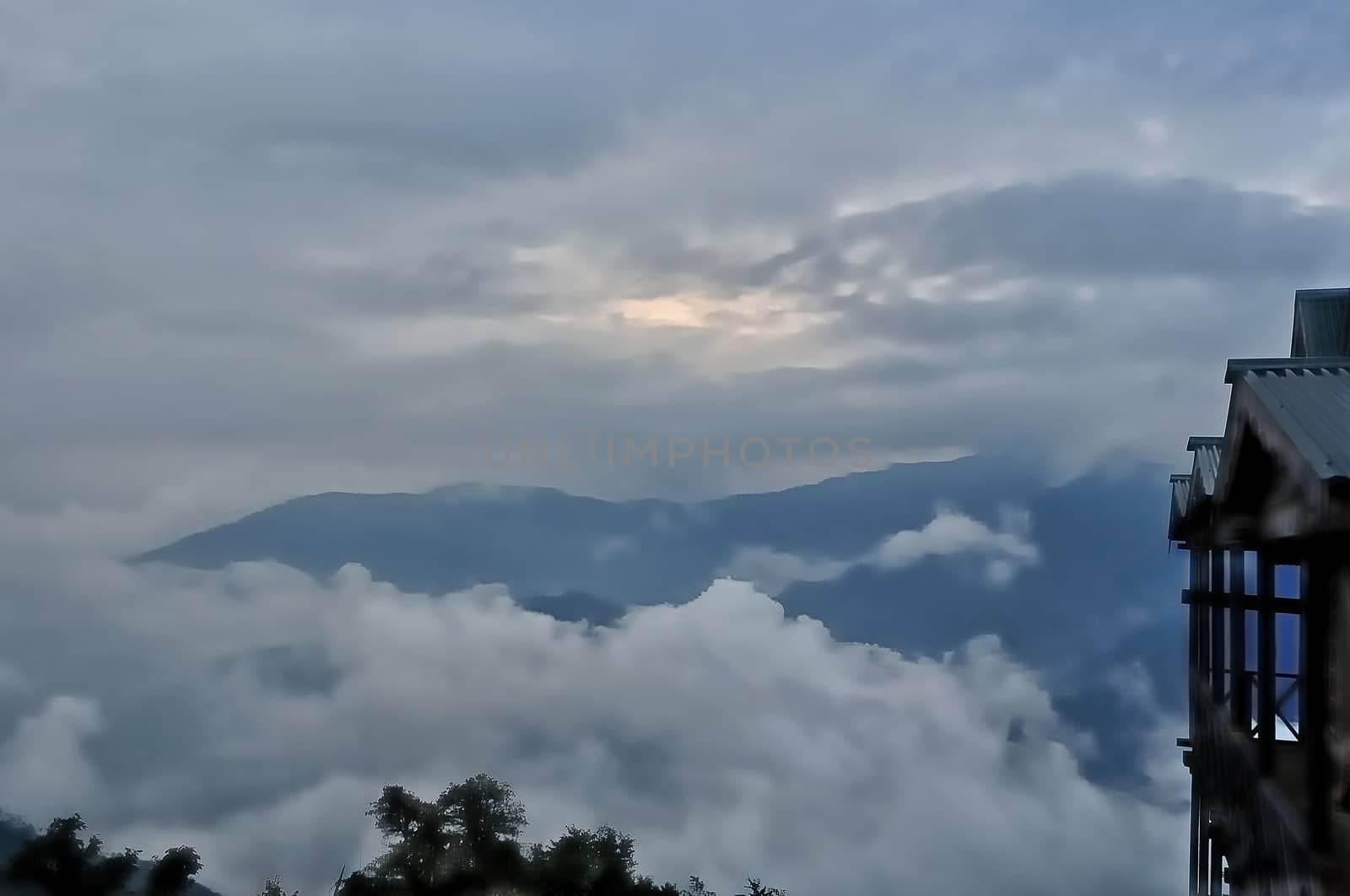 Sea of clouds,blue mountain,cottage, bush,storm clouds,