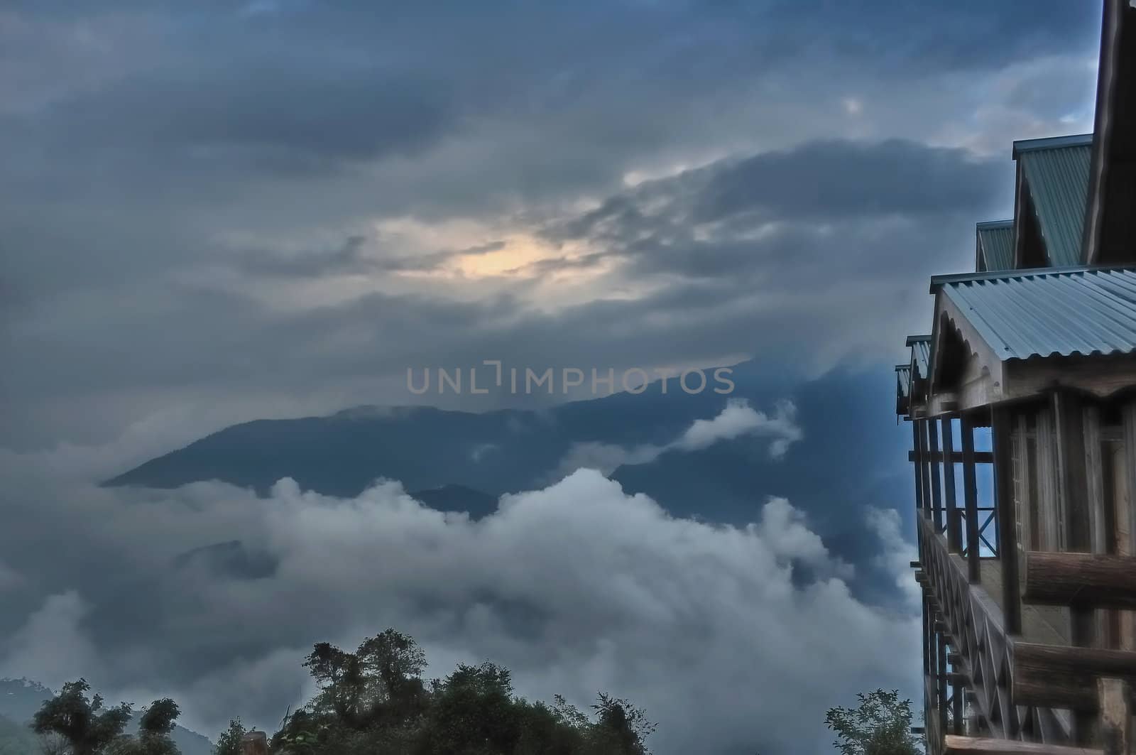 Sea of clouds,blue mountain,cottage, bush,storm clouds,