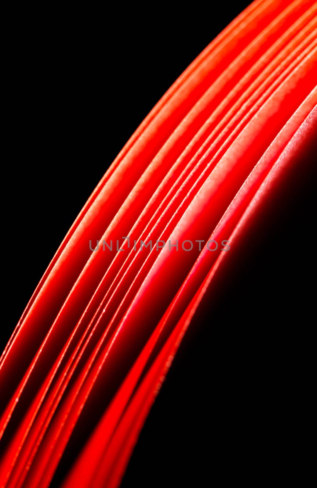 red A4 paper glows when illuminated by light and can be seen as flowing red from top edge in portrait orientation
