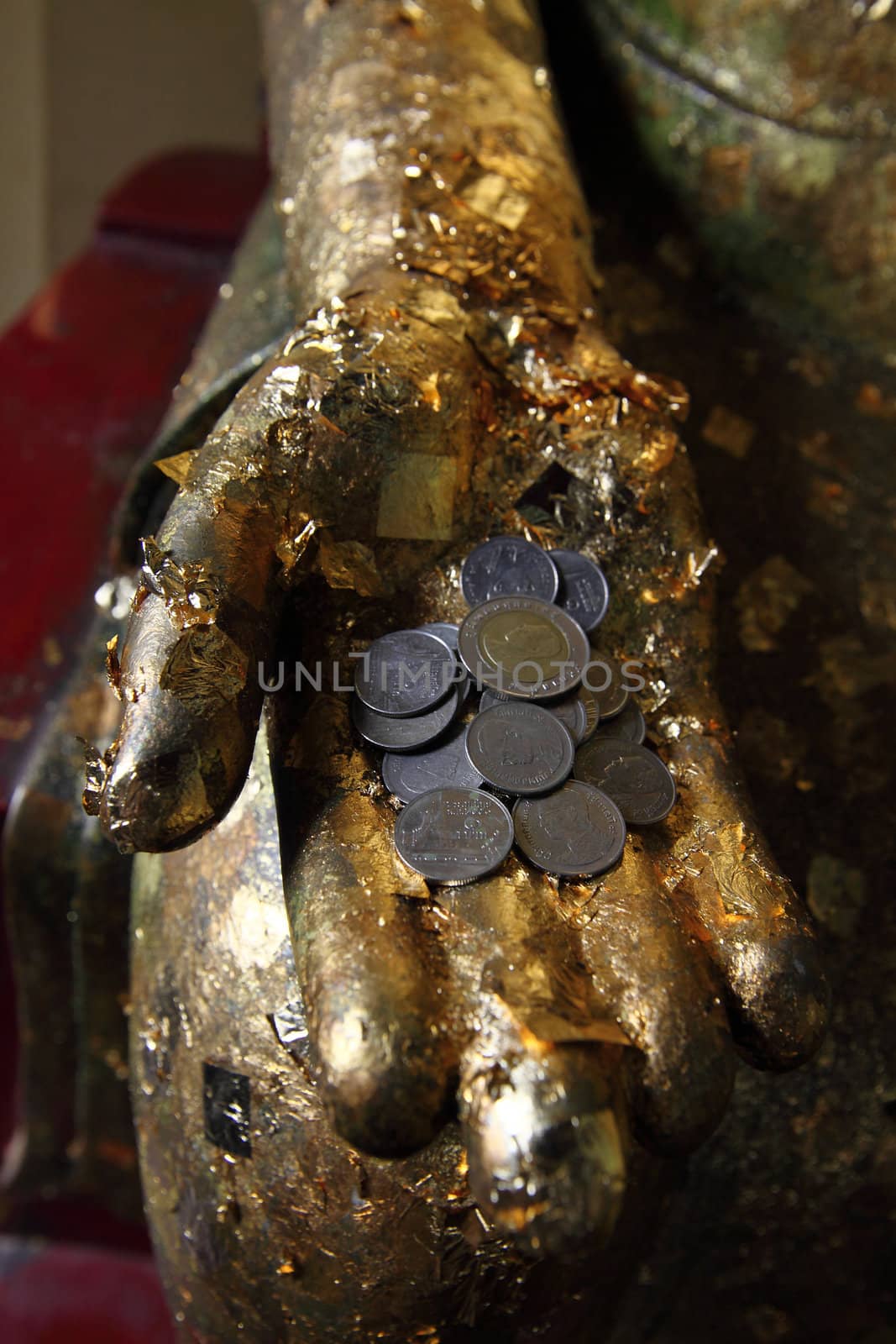 Golden buddha hand at Ayudhaya near Bangkok, Thailand. 