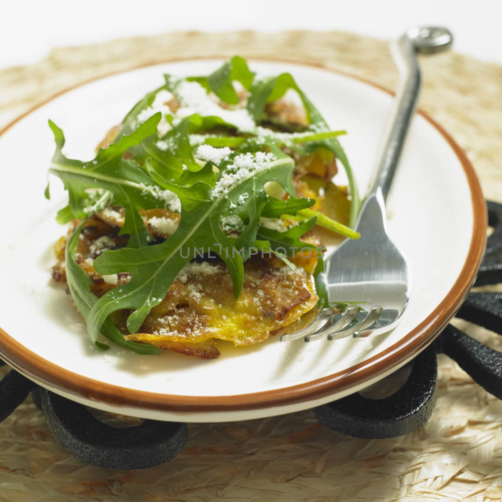 potato omelet with rucola and parmasan