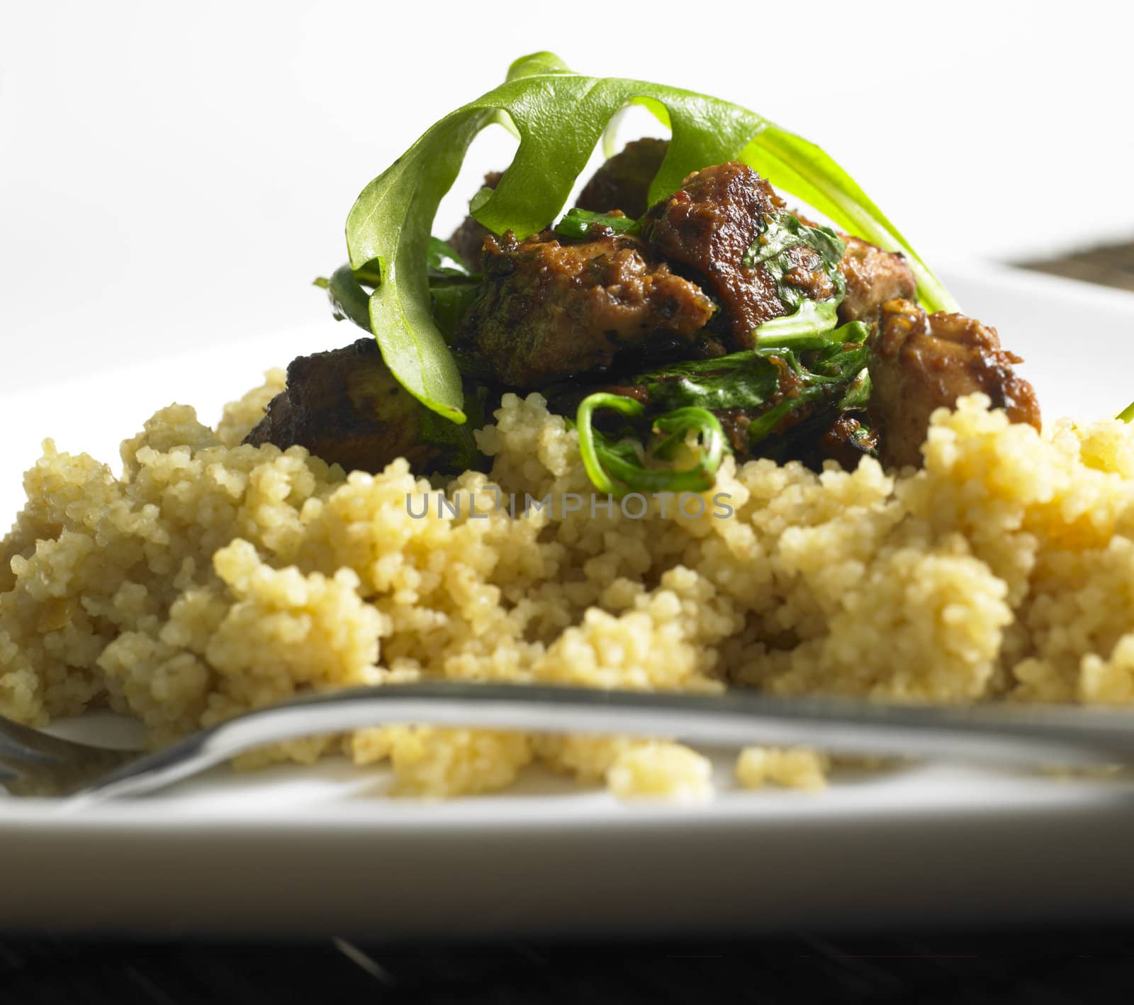 chicken meat with rucola on couscous by phbcz