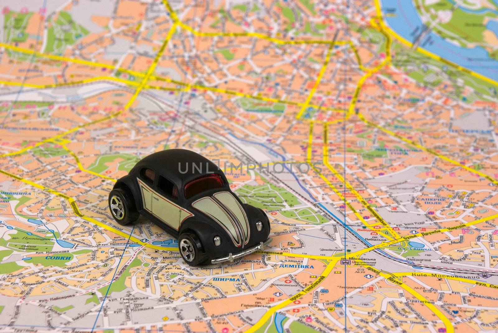 Small car on the map of Kiev