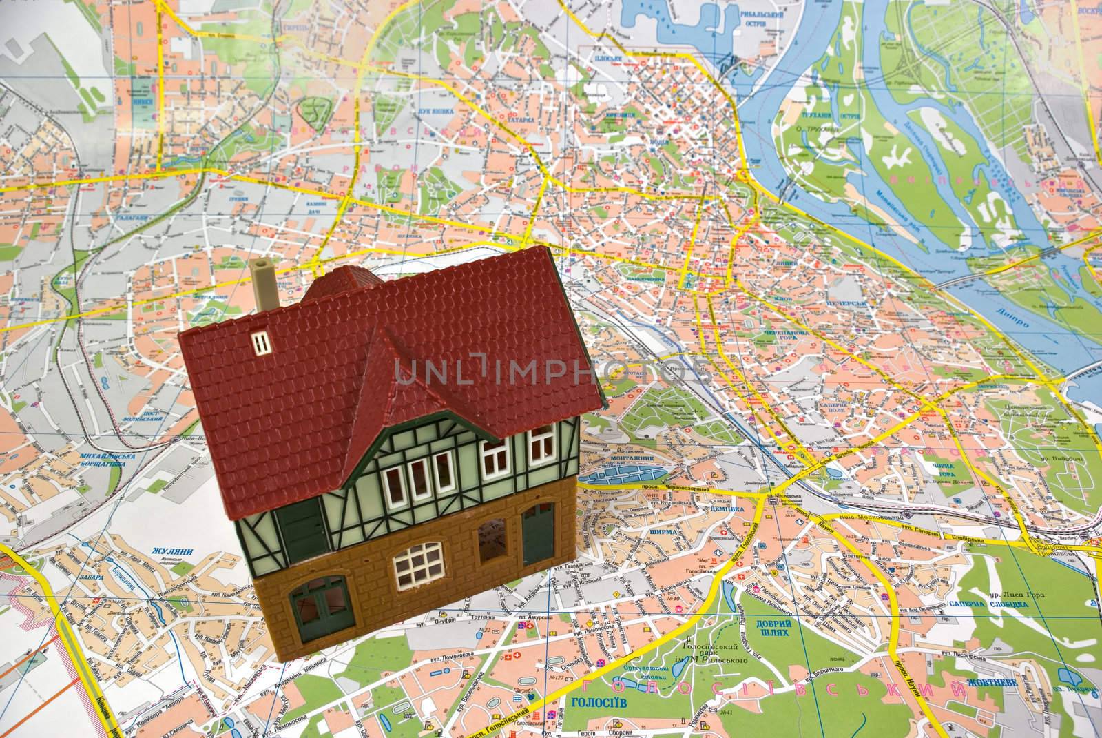 Model of a detached house on a city map