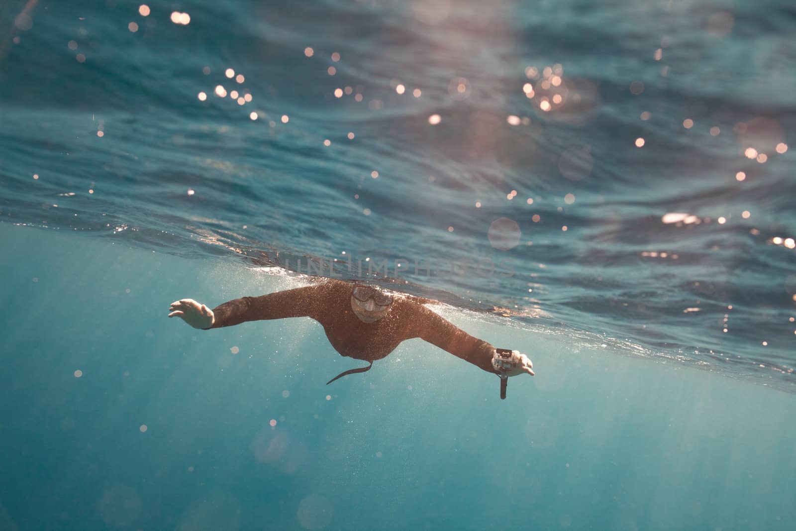 a portrait of freediver in water