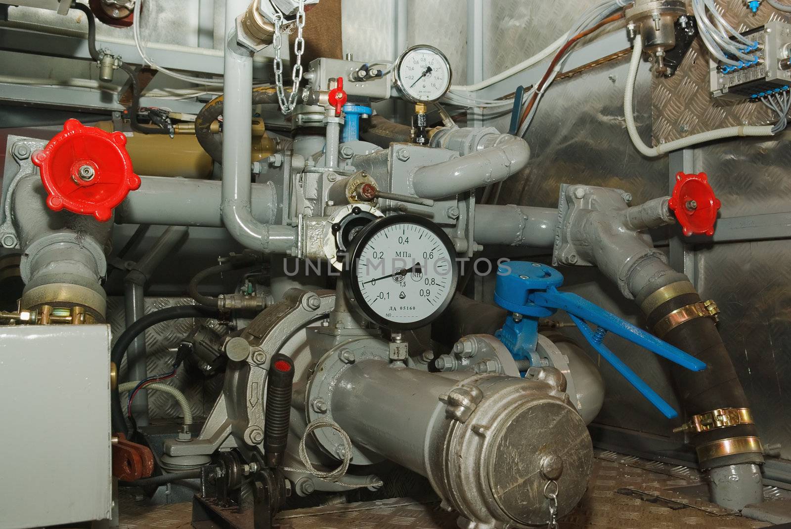 Complex pumping and valve controls on a pumper firetruck.