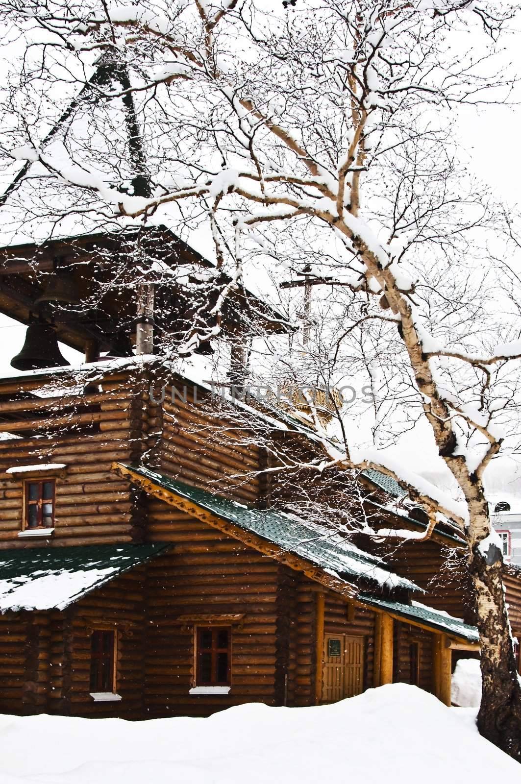 front elevation of a snow wooden church