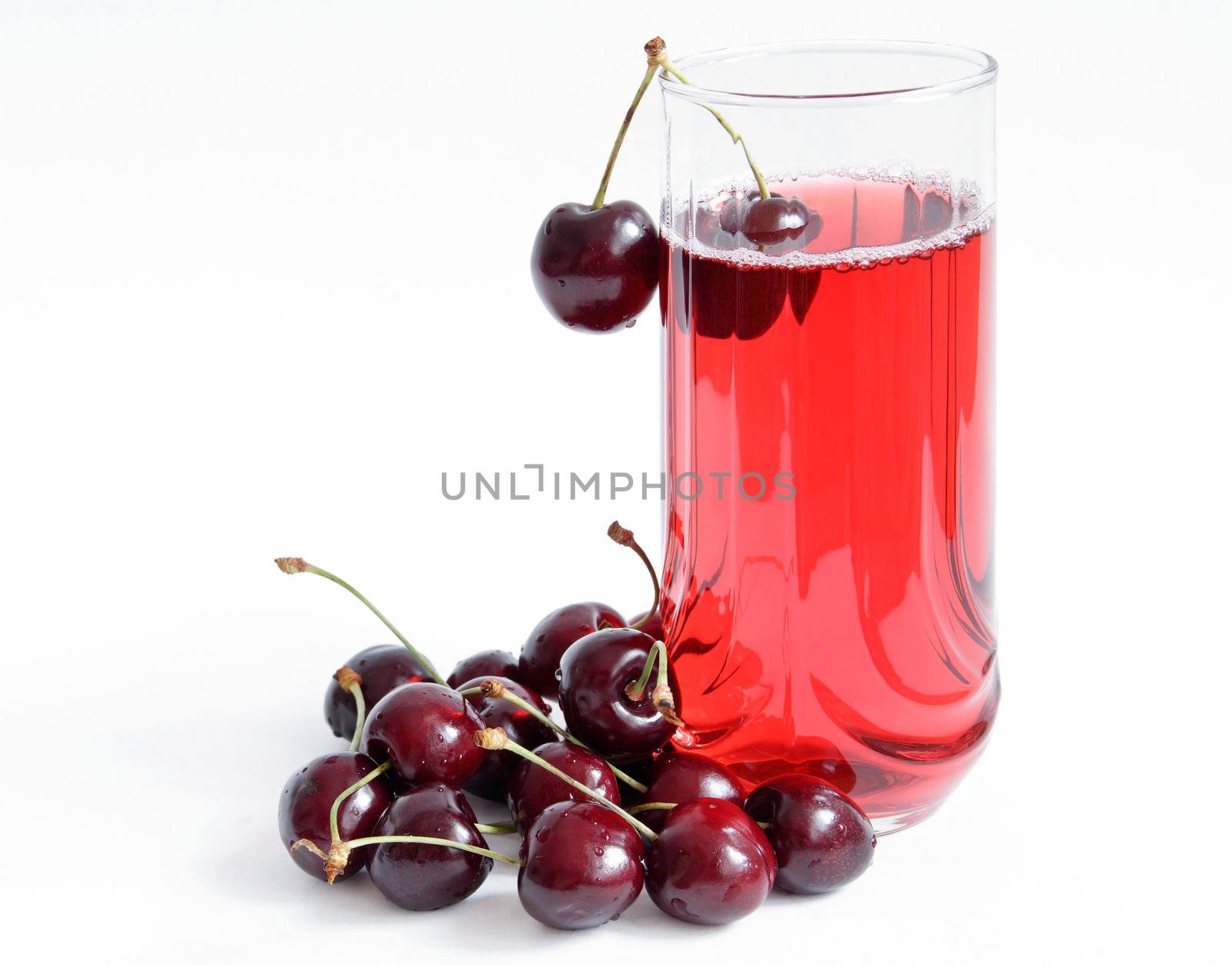 Berry juice in glass isolated on white background