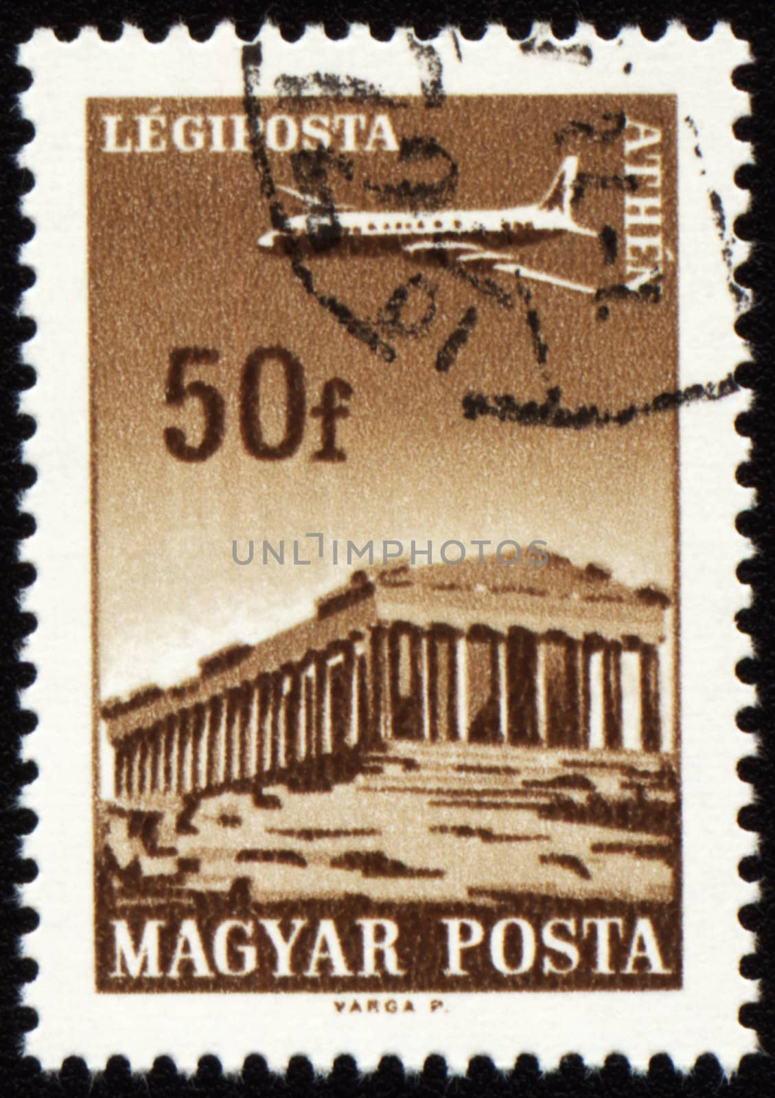 Flying plane above the Athens on post stamp by wander