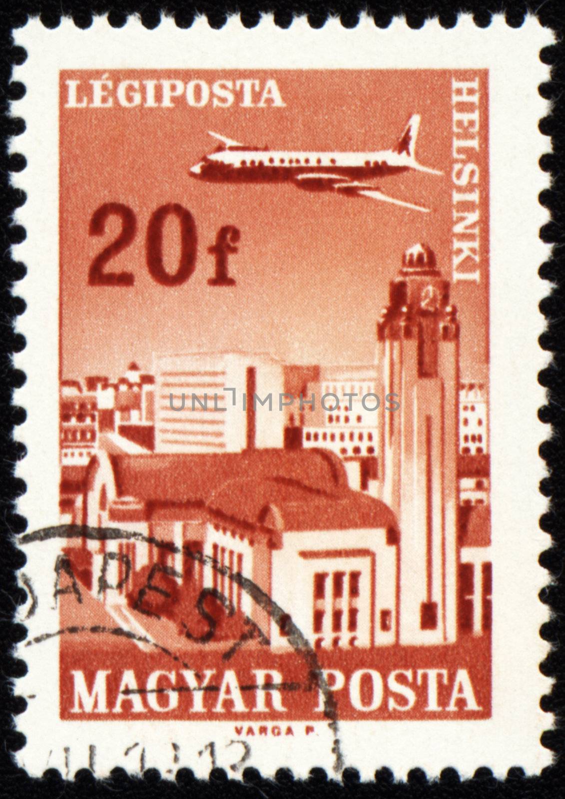 HUNGARY - CIRCA 1966: A stamp printed in Hungary shows flying plane over the Helsinki, series, circa 1966