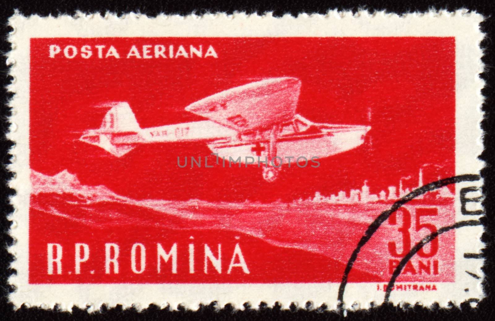 ROMANIA - CIRCA 1960: A stamp printed in Romania shows flying vintage ambulance plane, circa 1960