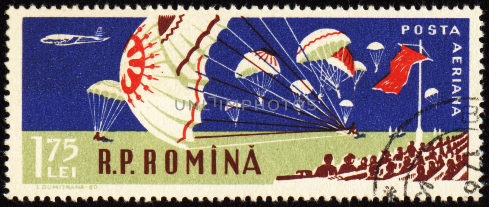 ROMANIA - CIRCA 1960: Parachutes at aviation sports event, landing in stadium, circa 1960