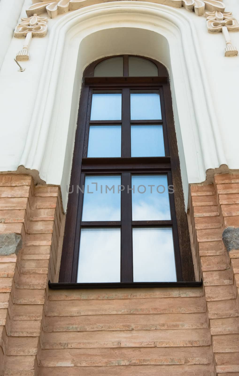 
Arc shaped window on a brick wall