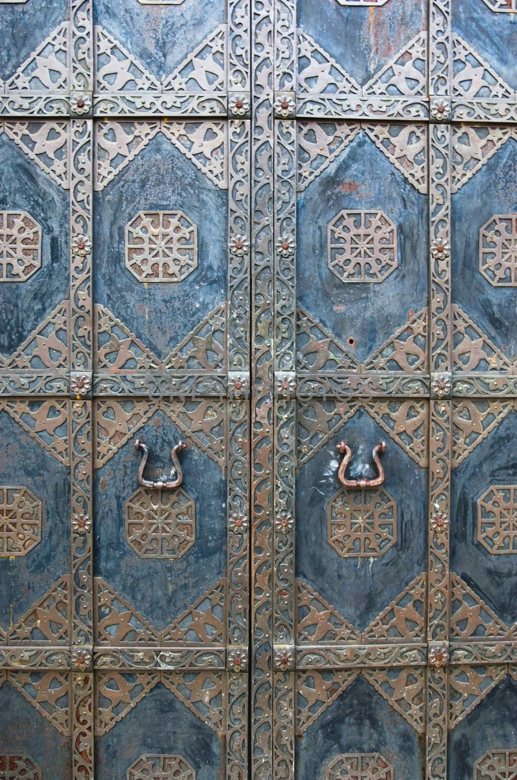 Black iron doors in old building in Kiev