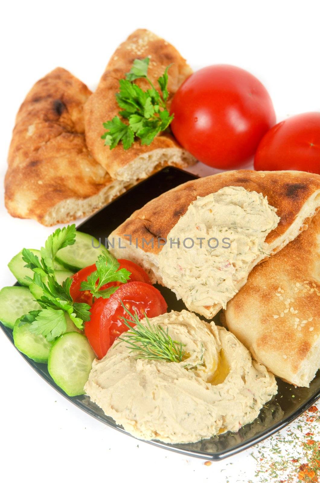 Bread with pate and fresh vegetables of tomatoes and cucumbers
