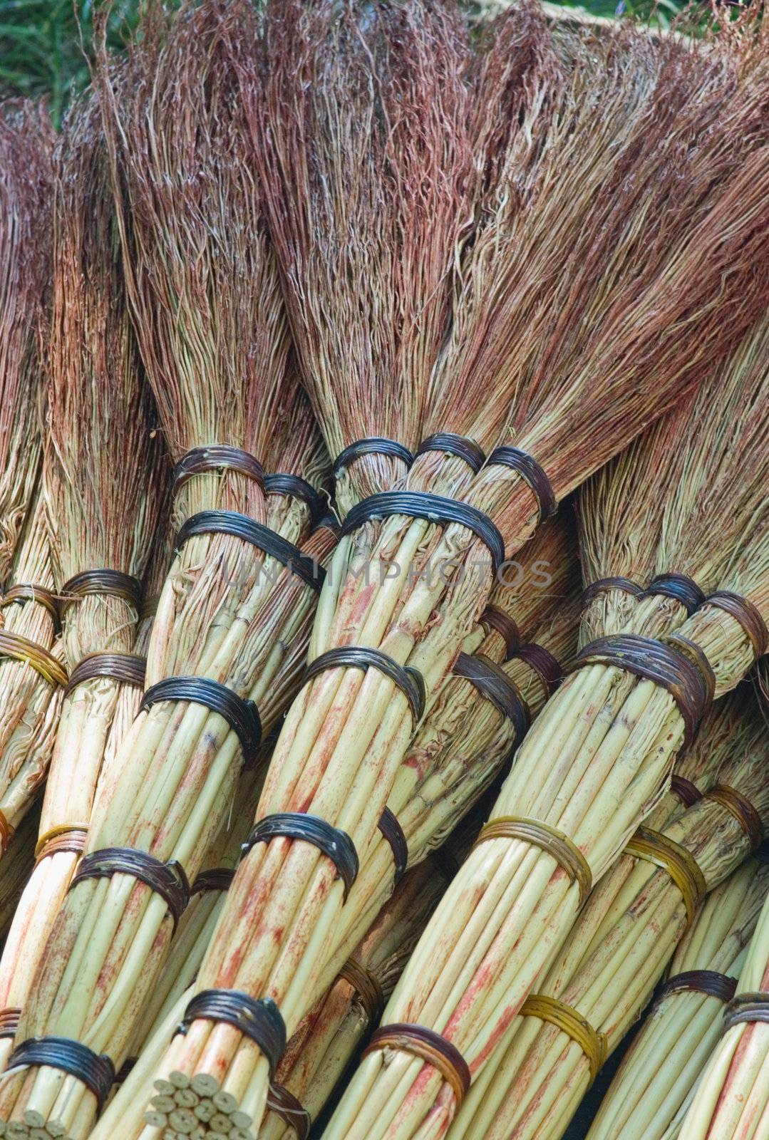 A lot of Short sweep traditional brooms