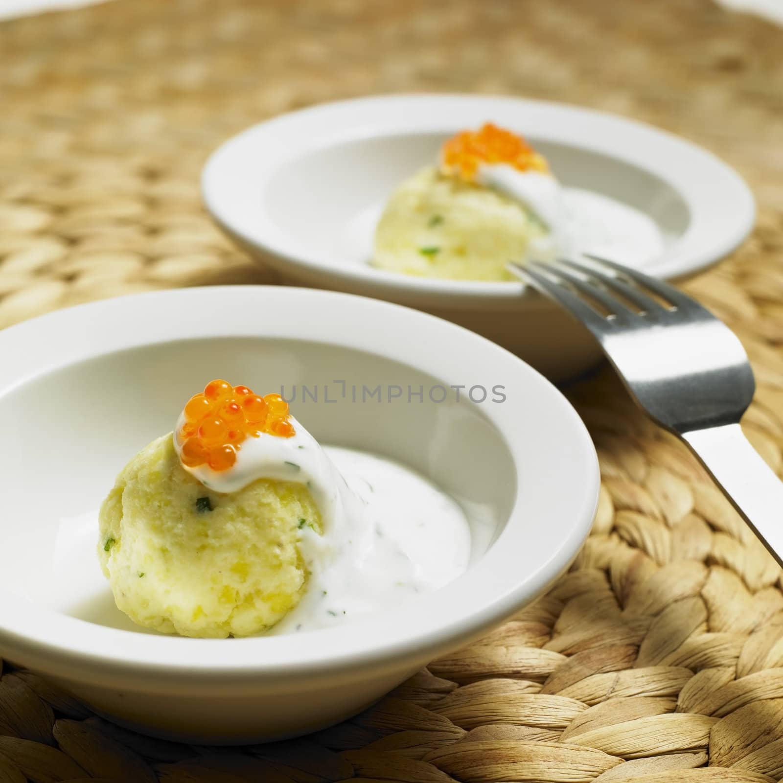 cold potato dumplings with cream and caviar