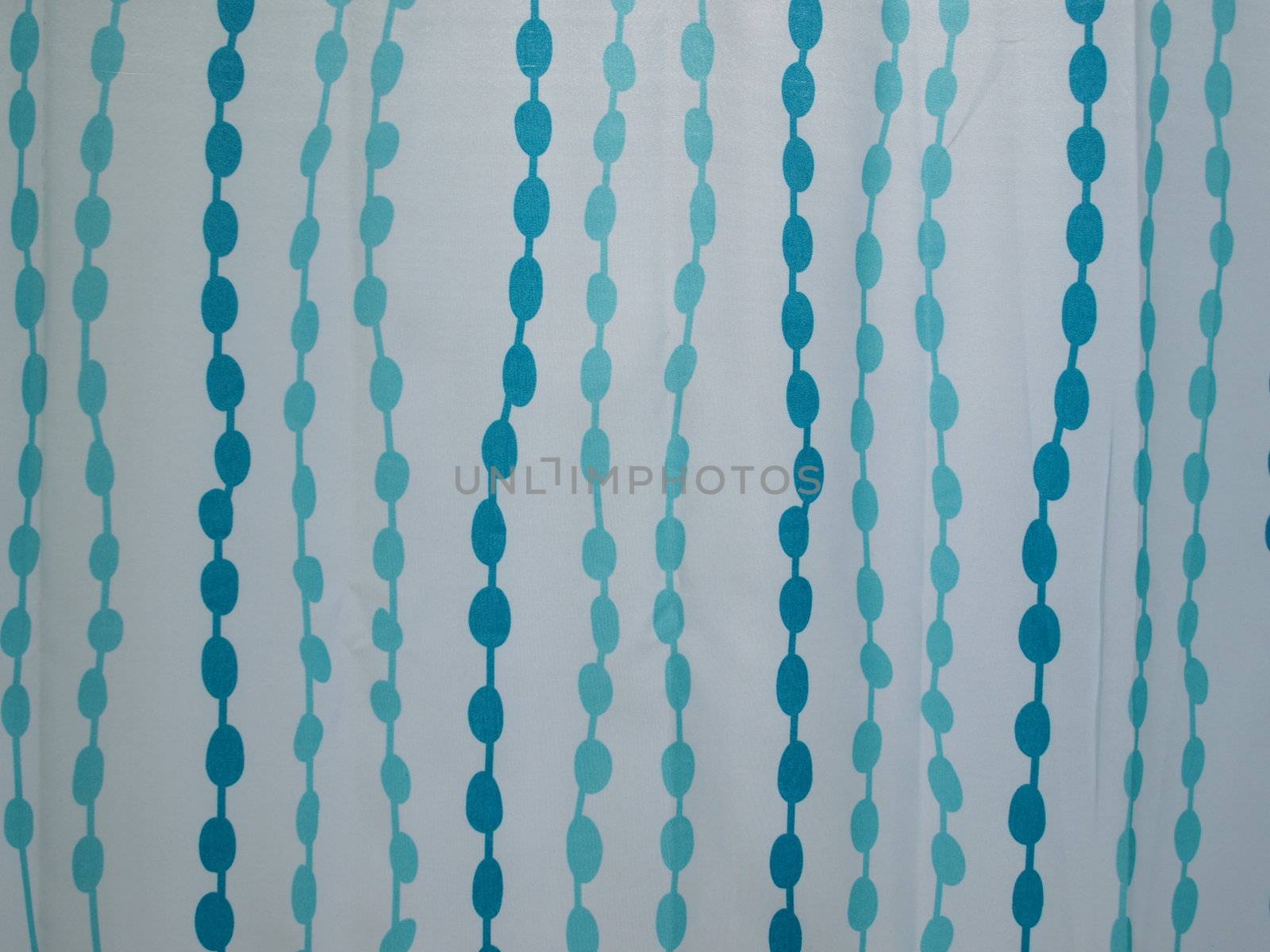 Shower curtain pattern in blues and green on white