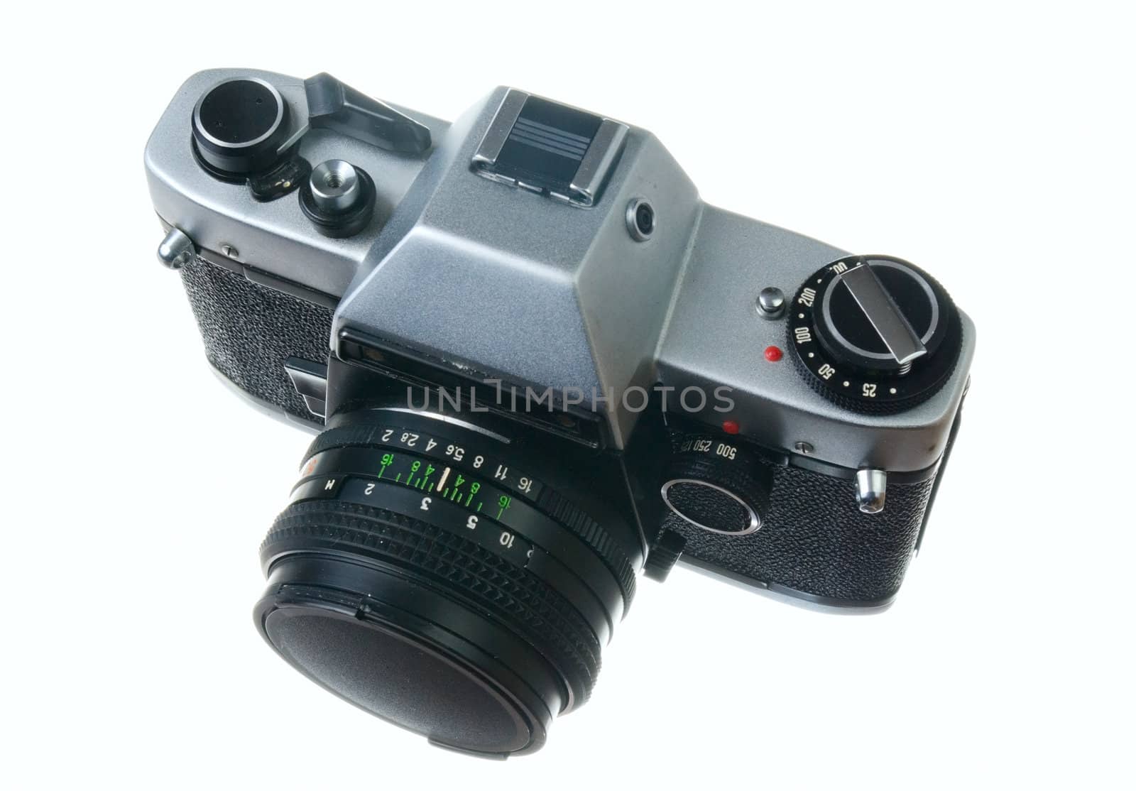 Old film camera isolated on a white background