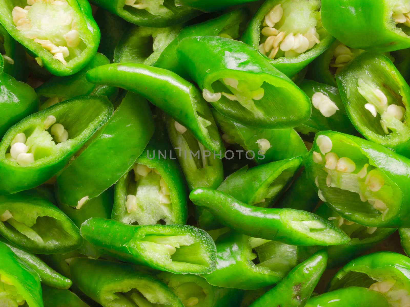 close up of sliced green chilies