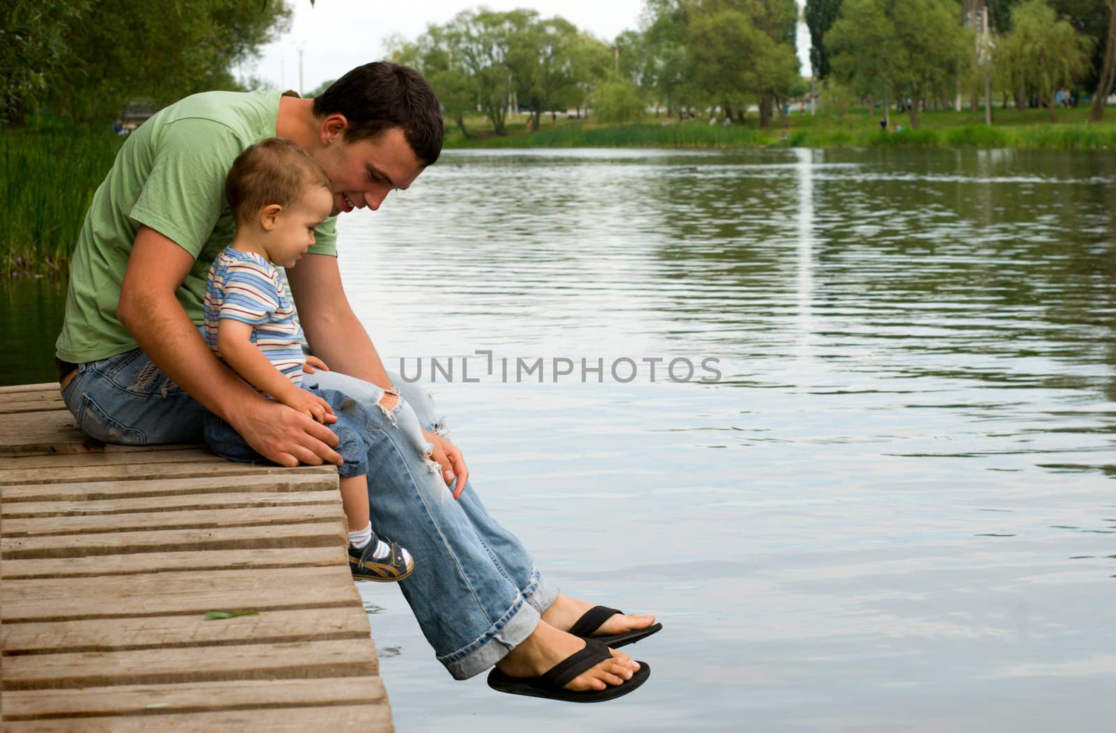 Father and son at the river by kzen