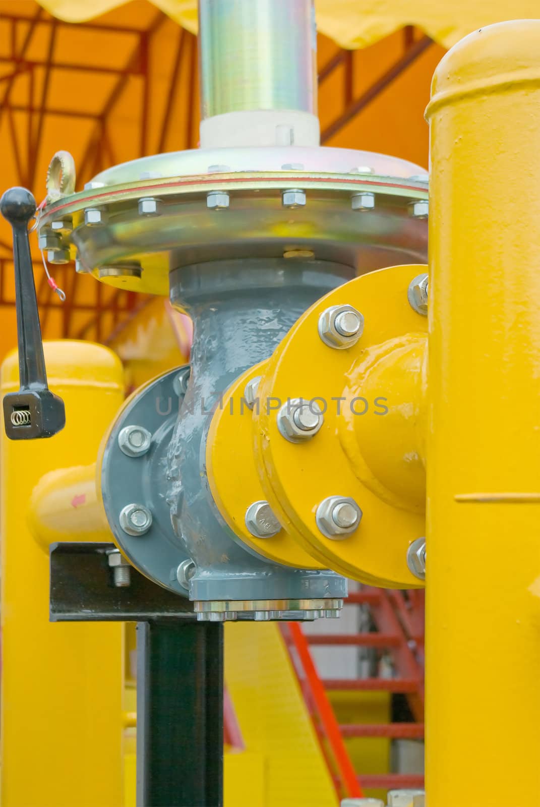 yellow gas pressure regulator with a crane and gear 