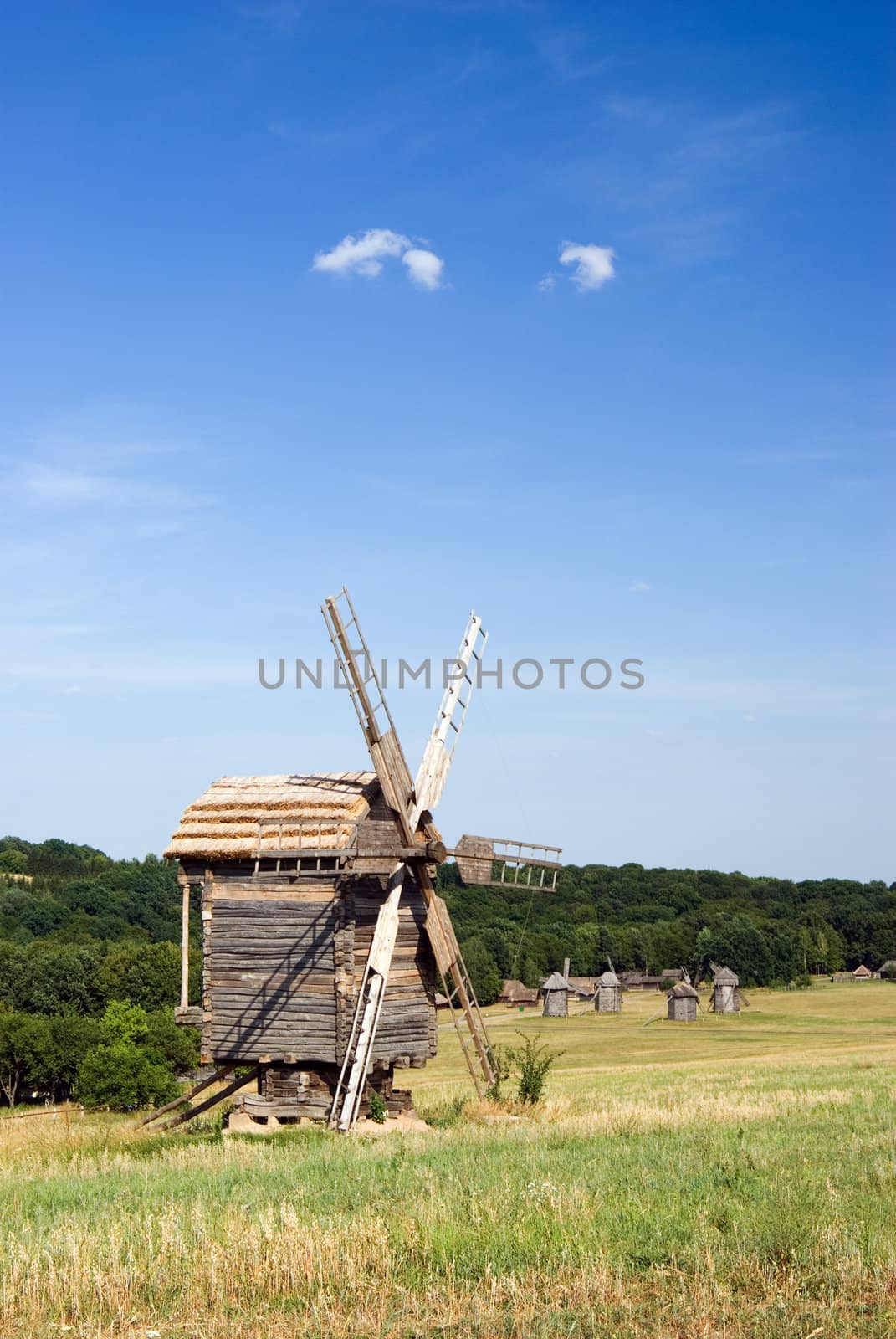 Old wooden windmills at Pirogovo ethnographic museum, near Kyiv, Ukraine