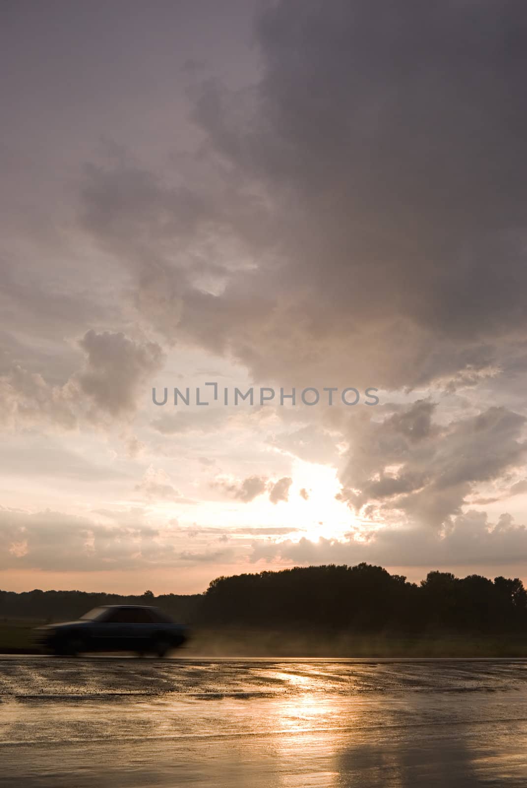 highway after the rain in the sunset