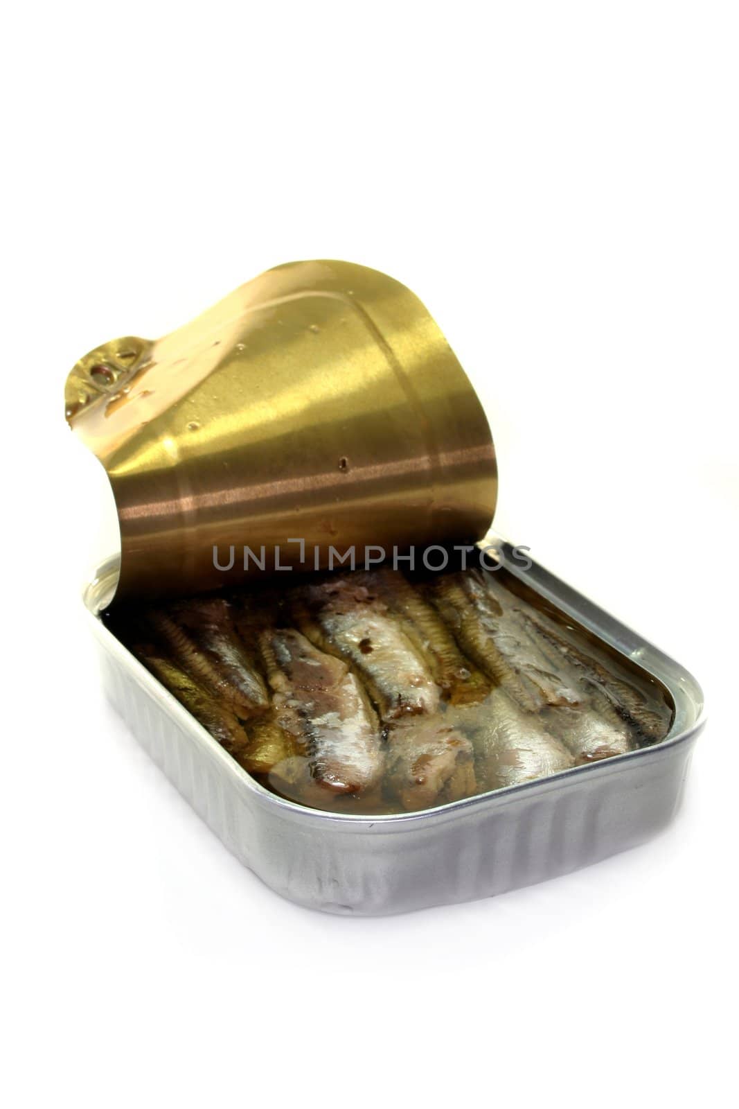 marinated anchovies in a fish box on a white background