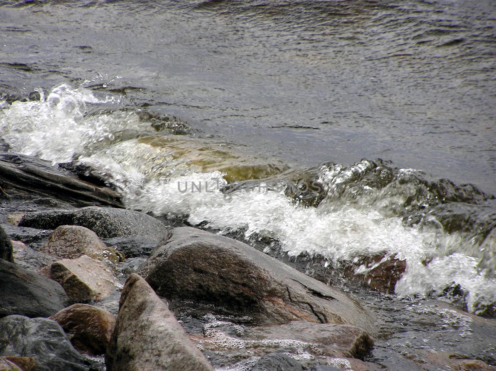 A wave on a Karelian lake, Russia