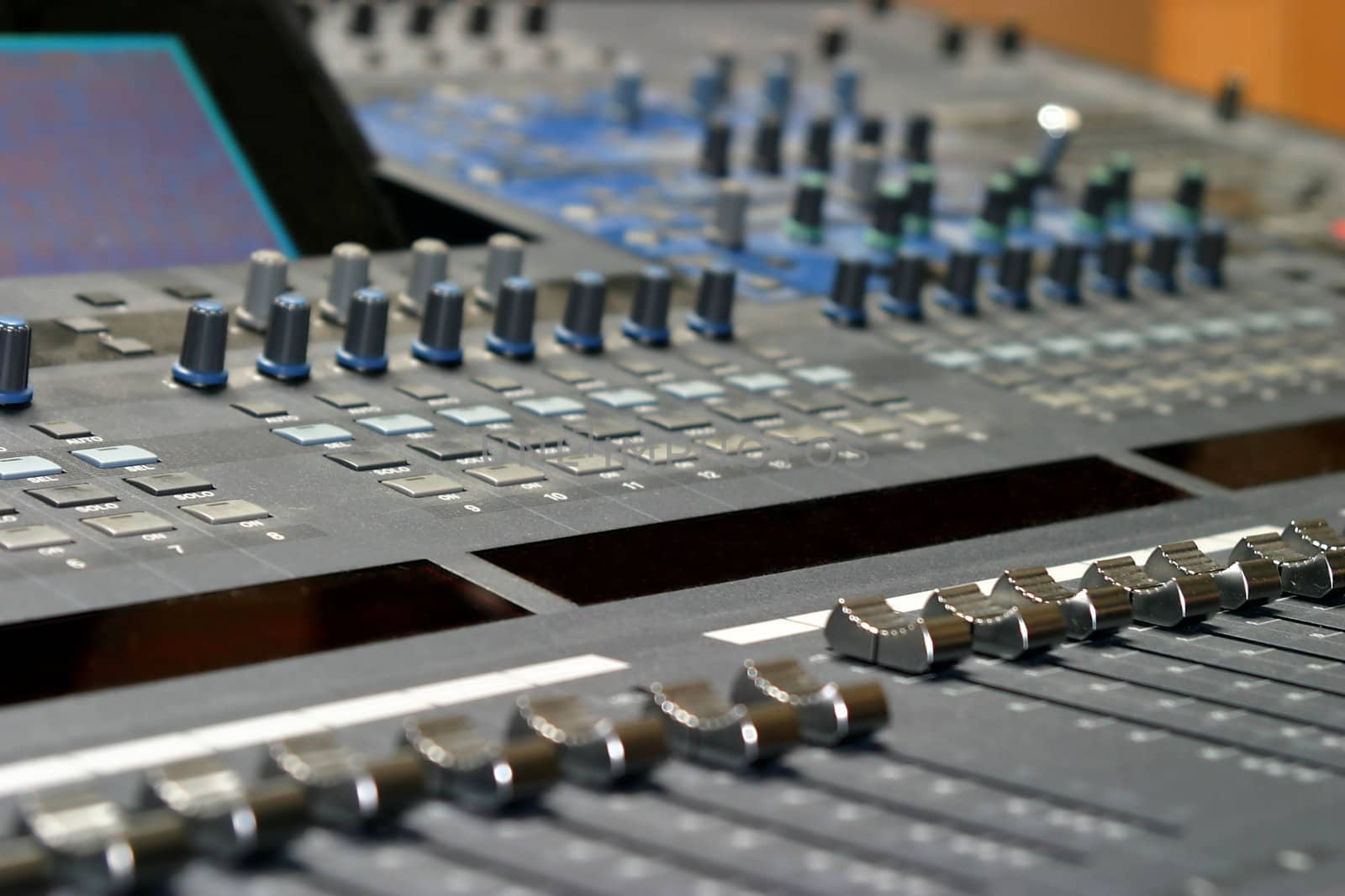 Top view of a mixing console in a music studio