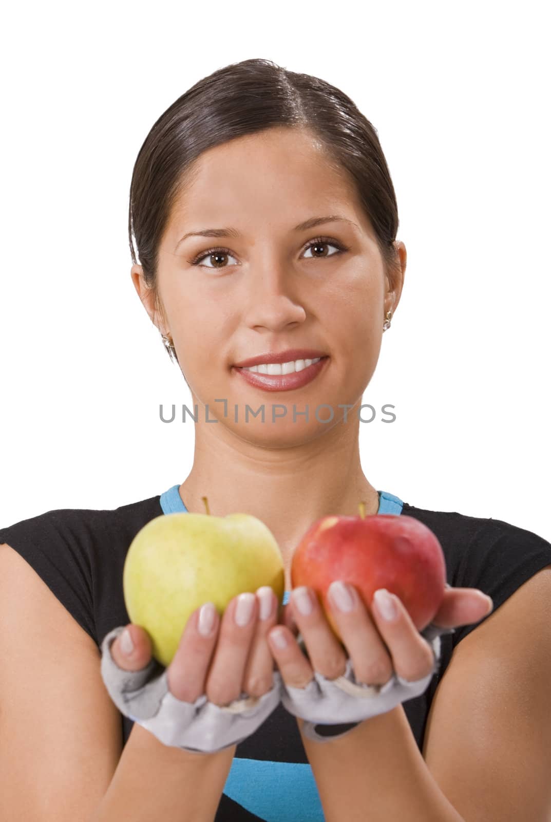 Smilling young sportsgirl offering a red and a green apple and inviting people to a healthy diet.