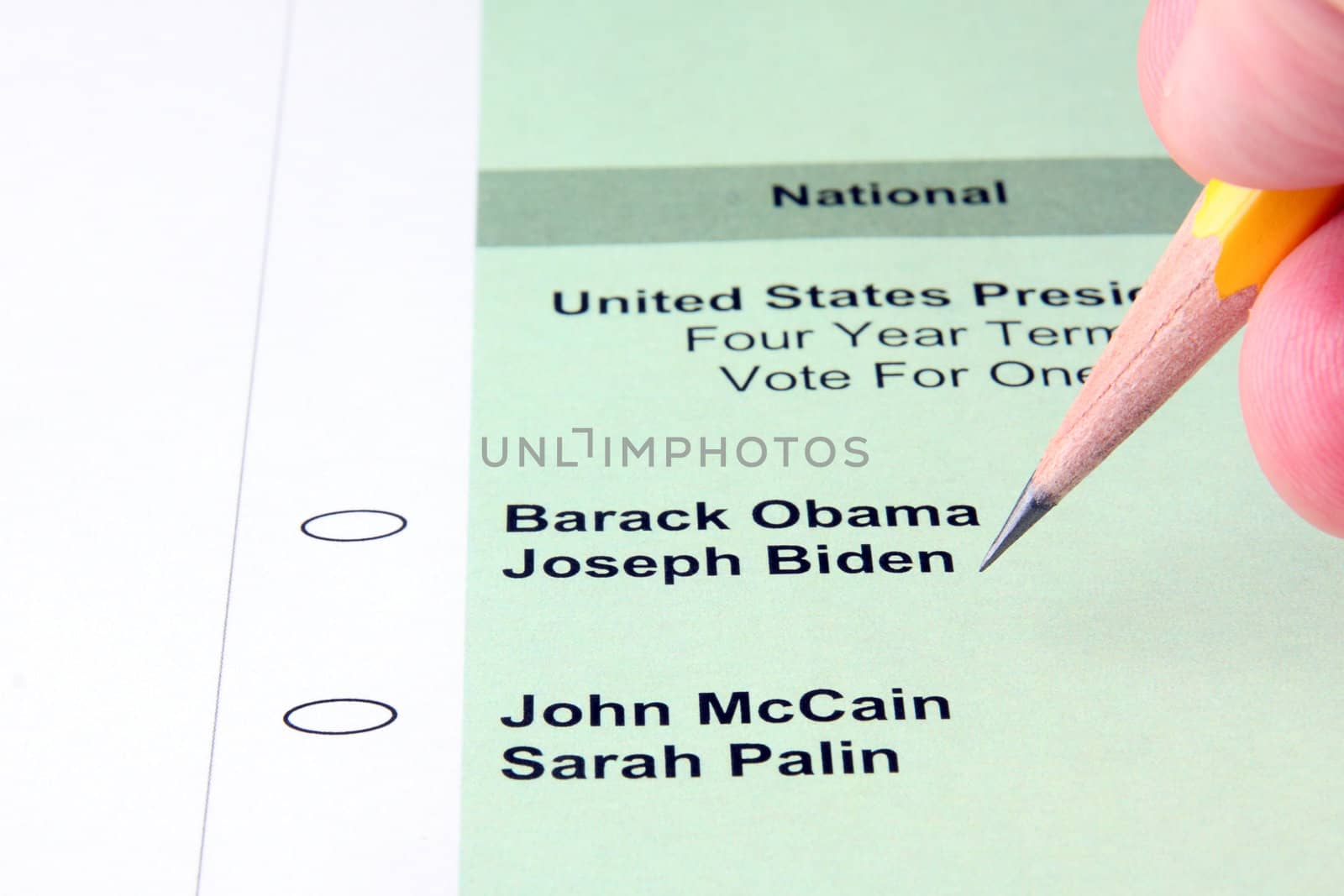 Person filling out ballot for US presidential election