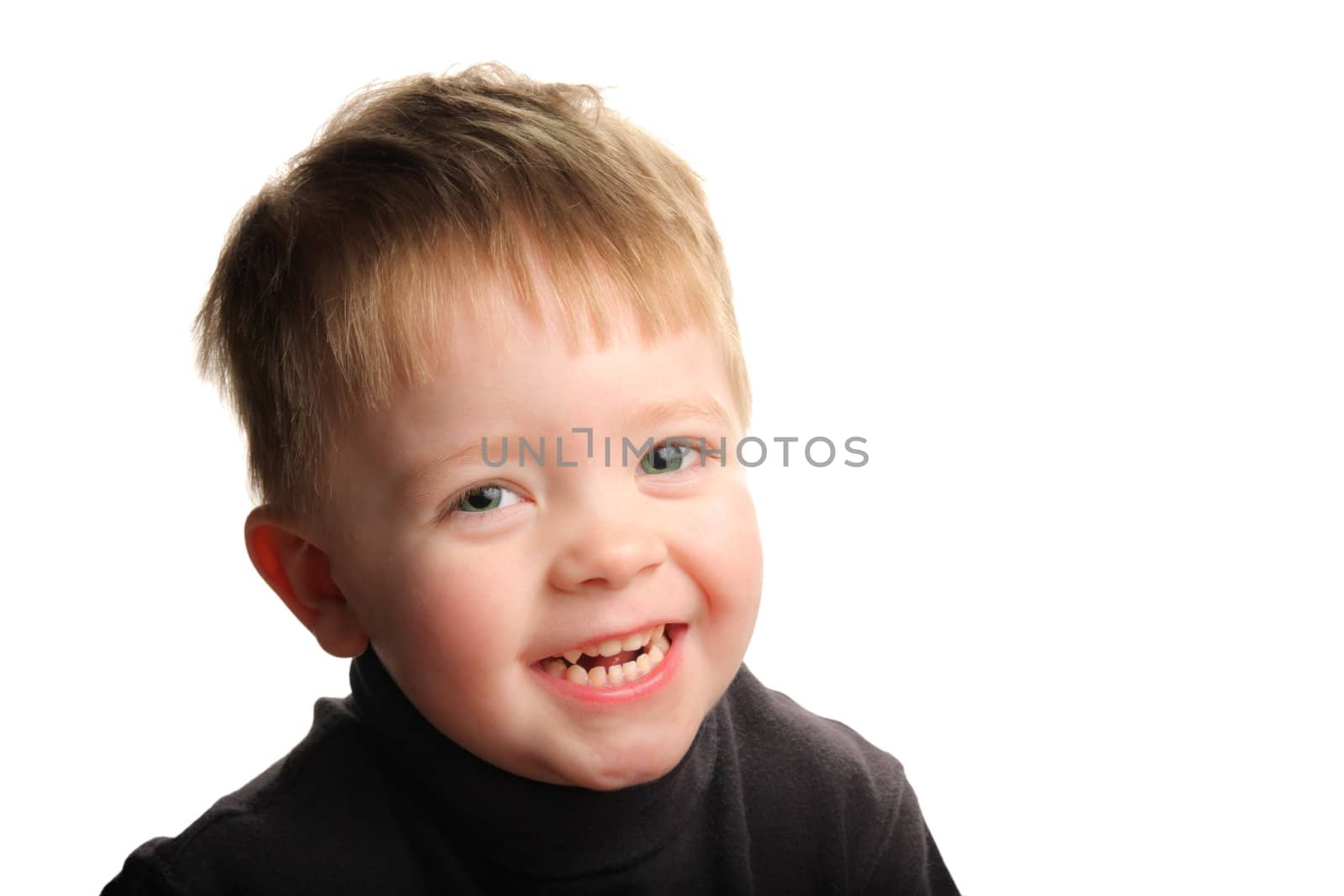 Cute young smiling boy with blond hair and green eyes, isolated on white