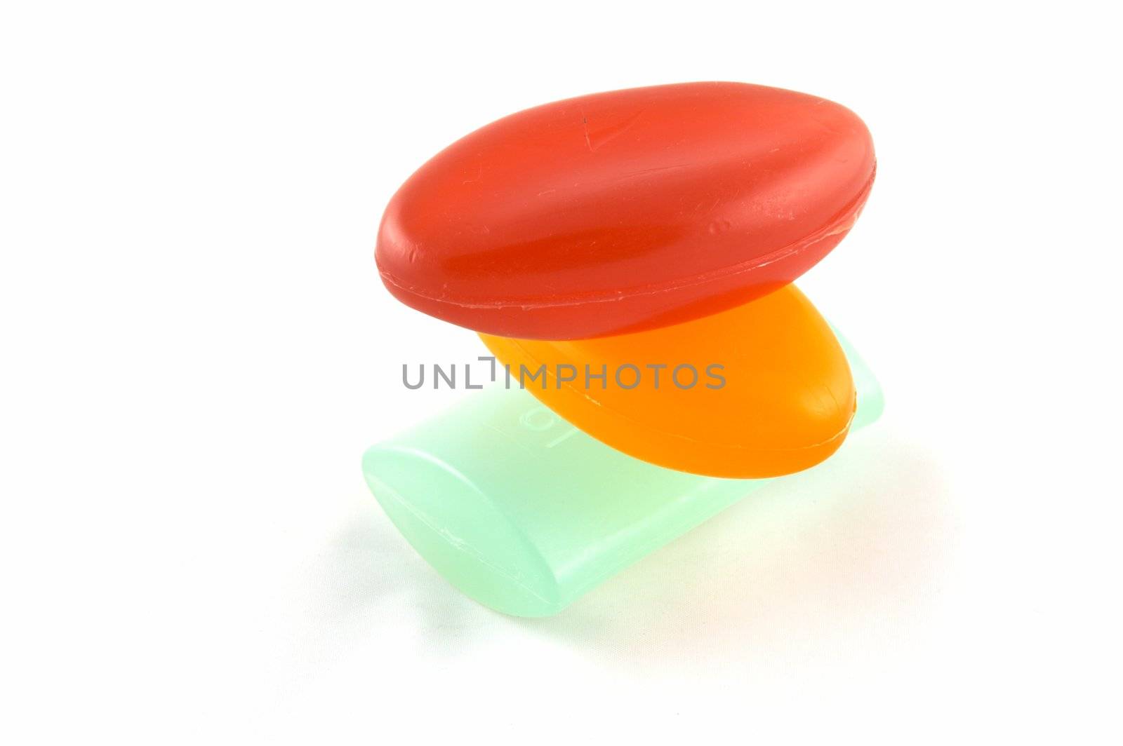 Multi-coloured soap on a white background