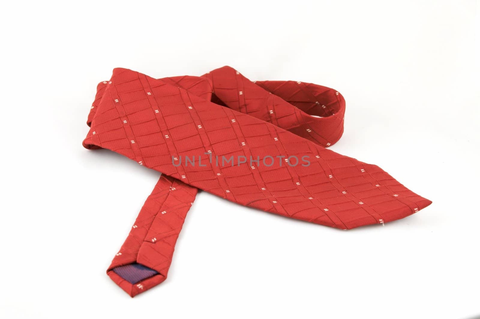 A red tie on a white background