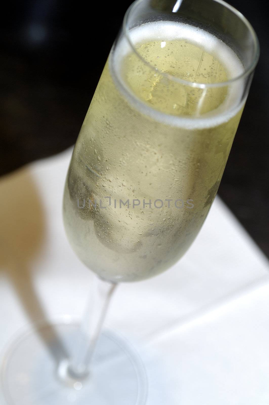 sparkling white wine in flute glass for celebration