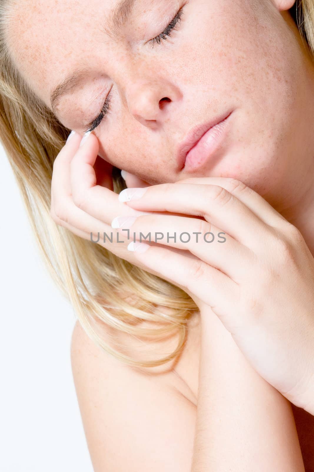 Studio portrait of a beautyfull blond model looking relaxed