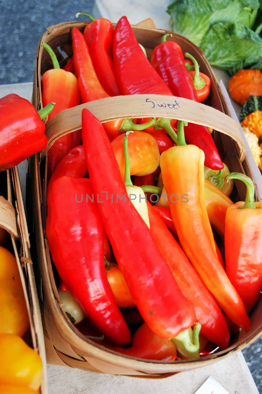 Red peppers at the farmers market by northwoodsphoto