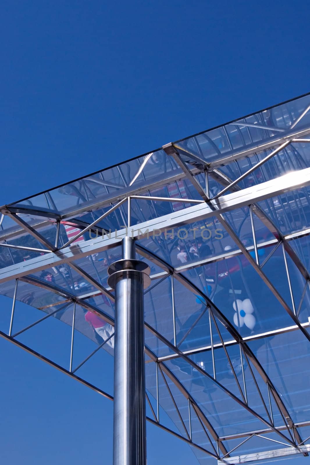 
streets reflected in the glass roof of modern building