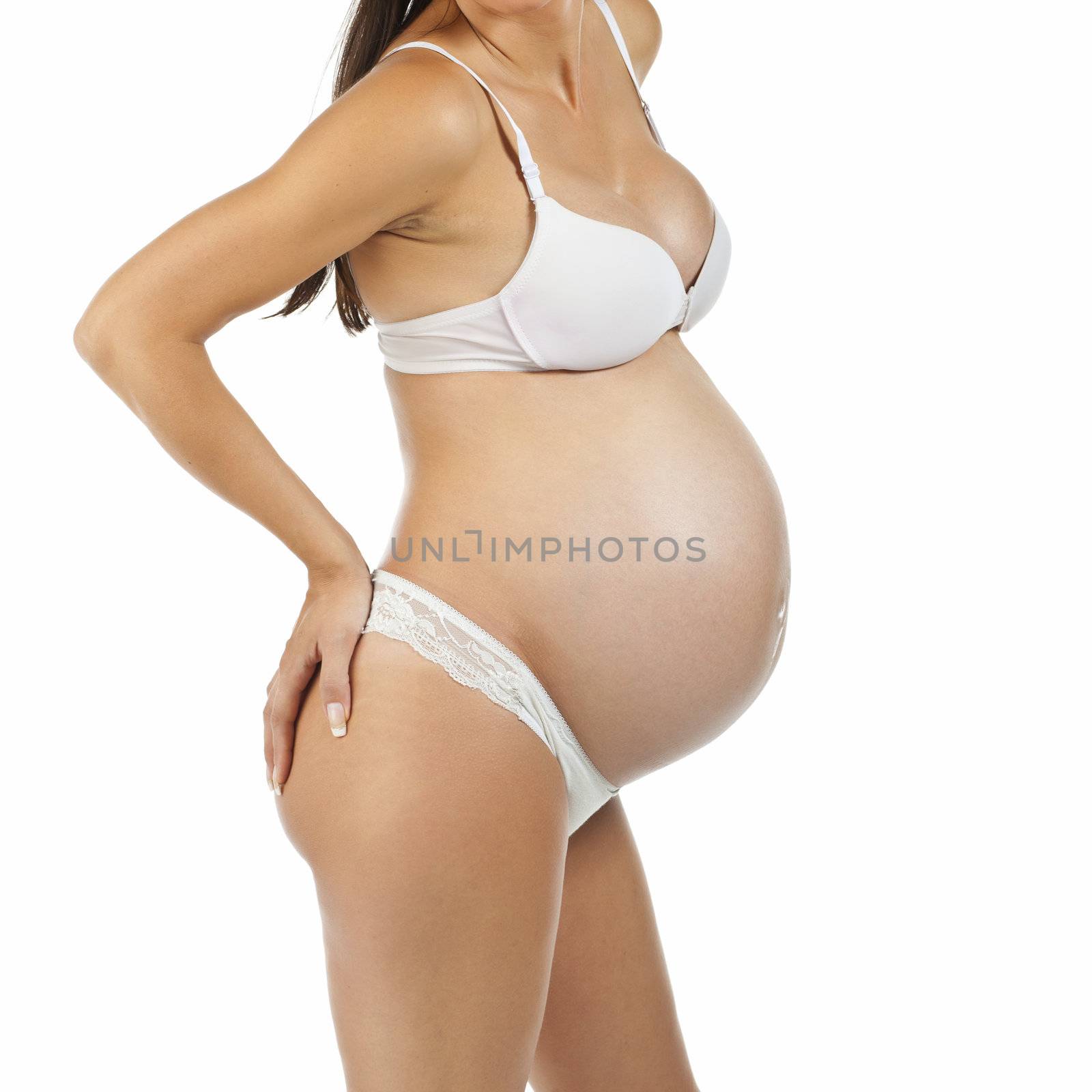 Future mother - Pregnant woman holding back