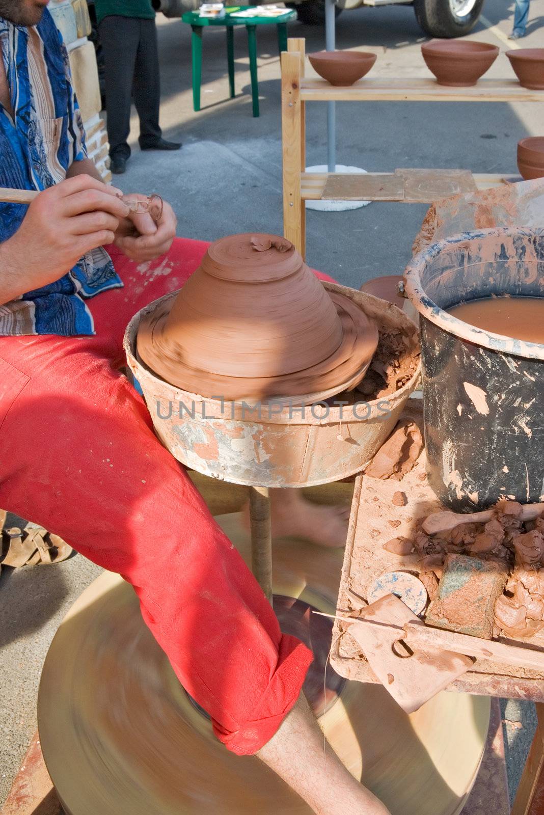 The potter behind work 