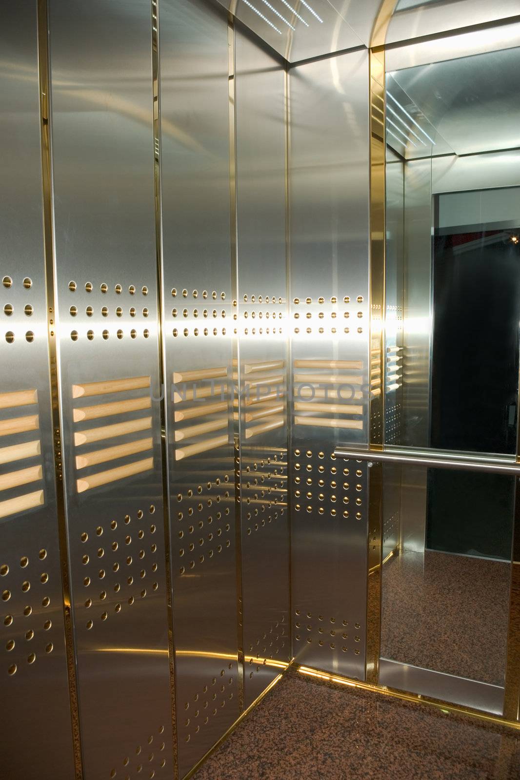 modern high-speed elevator with mirrors