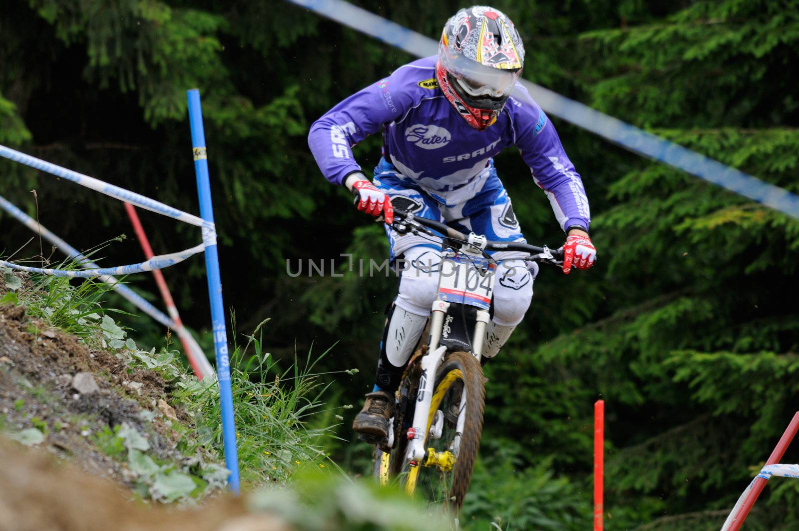 LEOGANG, AUSTRIA - JUN 12: UCI Mountain bike world cup. Participant at the downhill final race on June 12, 2011 in Leogang, Austria.
