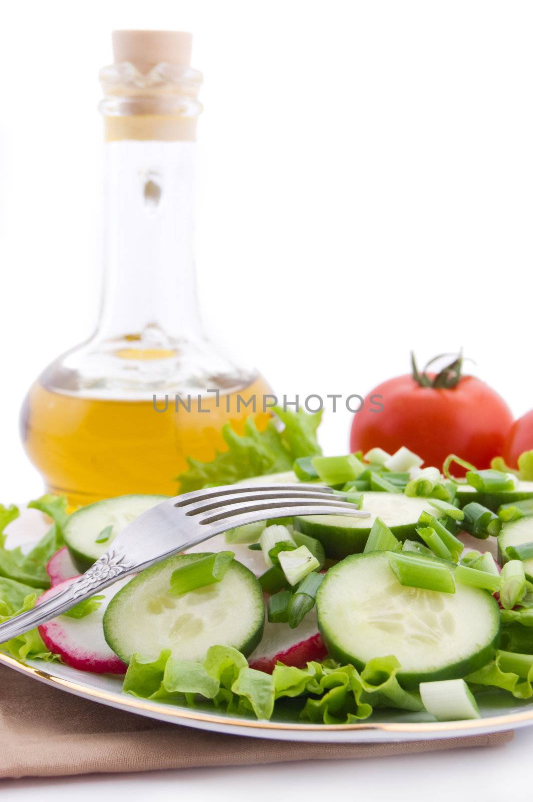 Redish, cucumber and onion salad with oil