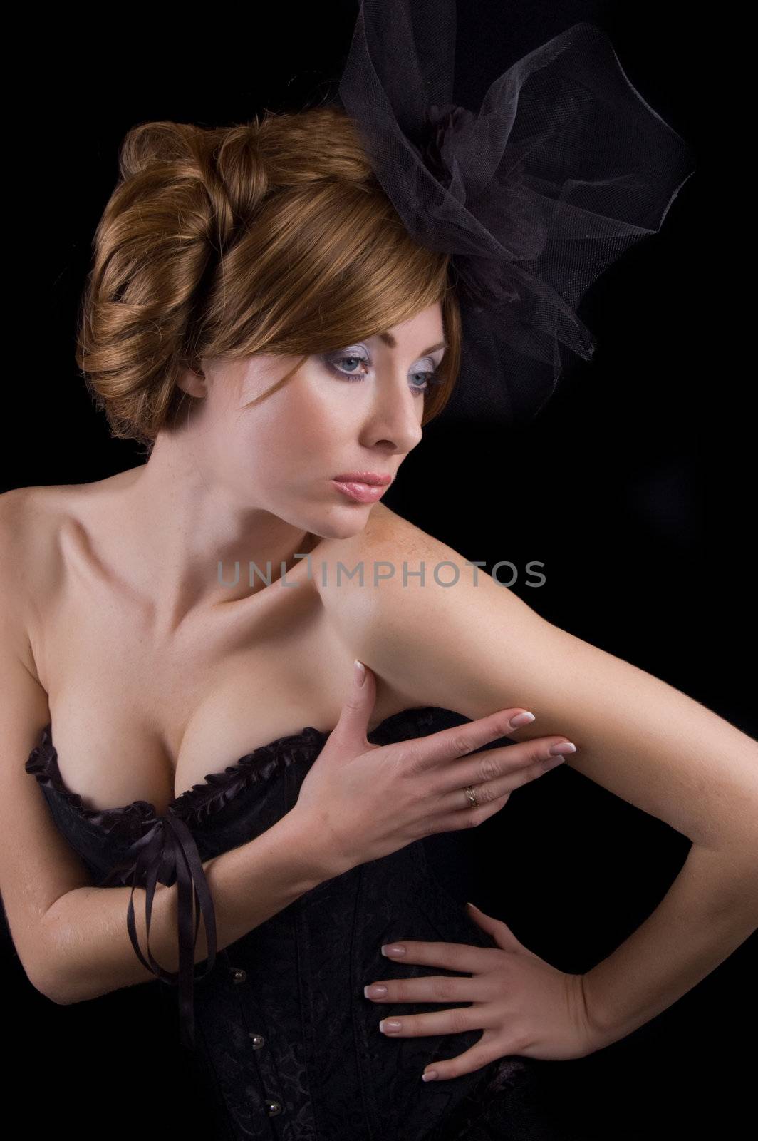 Graceful retro-style woman isolated on black